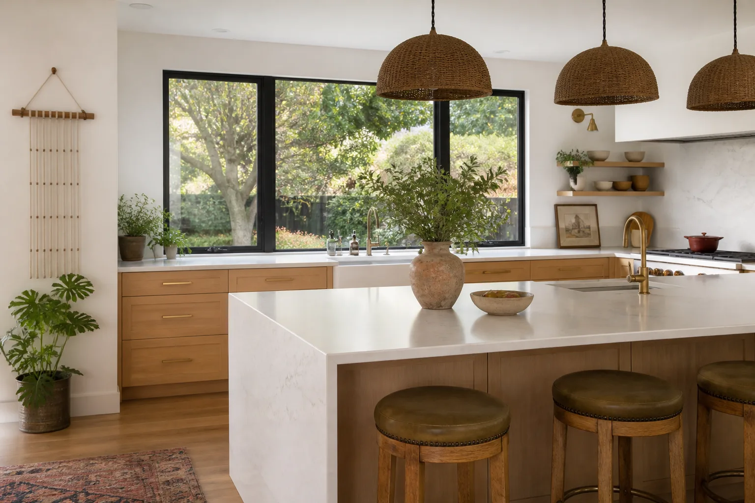 A remodeled kitchen with a waterfall island and wood cabinets